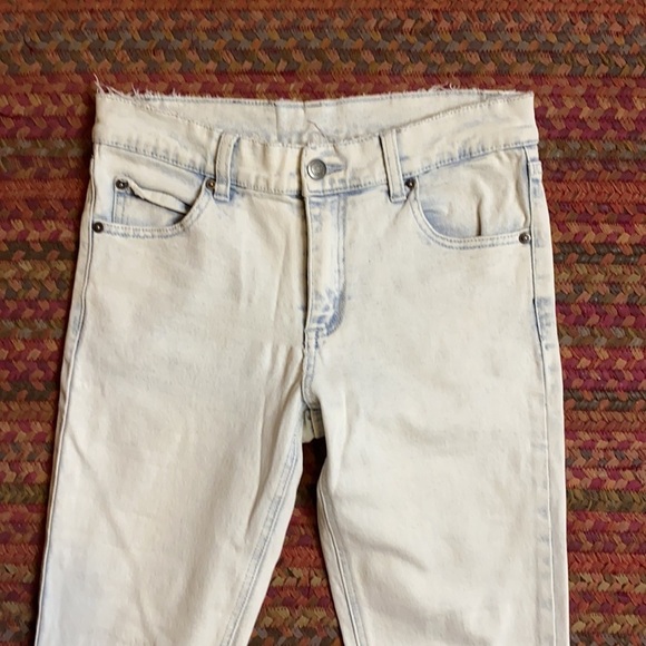 CHEAP MONDAY LIGHT WASH RIPPED KNEE SKINNY JEANS - Picture 2 of 7